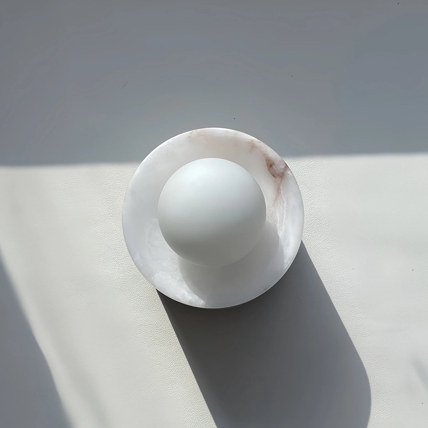 Liri Alabaster Orb Wall Light | Celestre