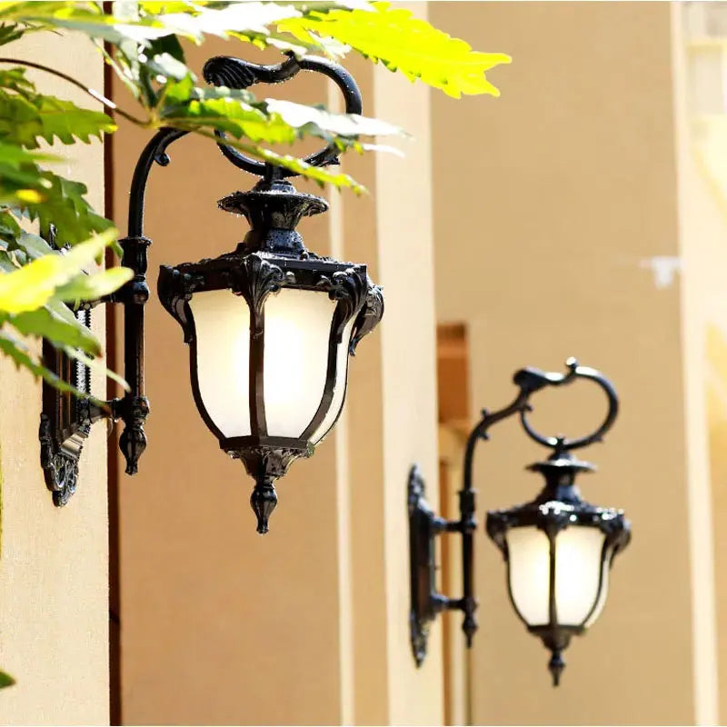 Dele Scrollwork Lantern Outdoor Wall Light | Celestre