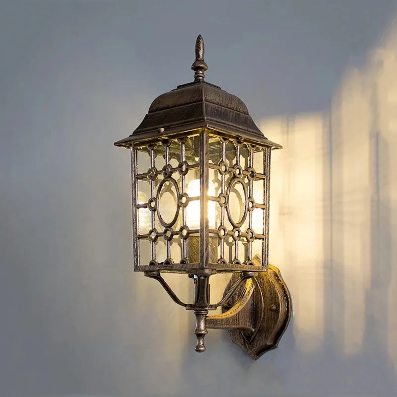 Anev Lantern Cage Outdoor Wall Light Bronze | Celestre