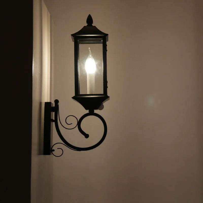 Zumo Lantern Scroll Arm Outdoor Wall Light | Celestre
