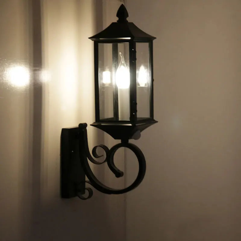 Zumo Lantern Scroll Arm Outdoor Wall Light | Celestre