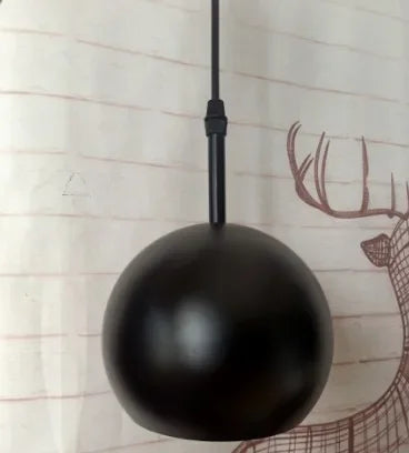 Tavlo Industrial Brass Globe Pendant Light Black | Celestre